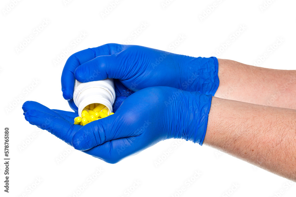 Crop hands of doctor with pills