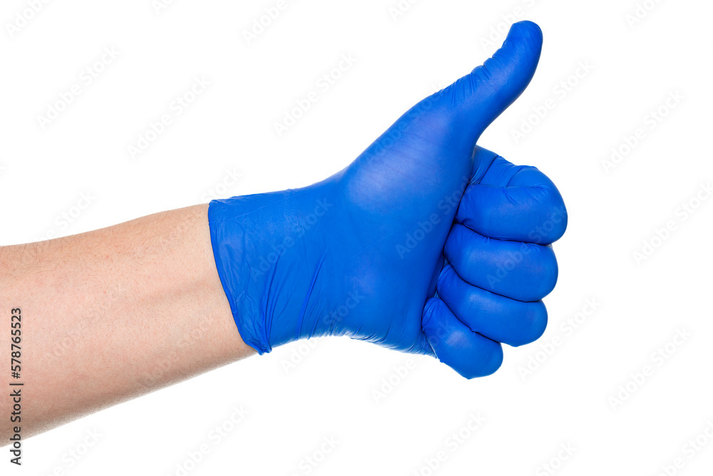 Crop hand of doctor in latex glove showing thumb up Crop hand of doctor in latex glove showing thumb up