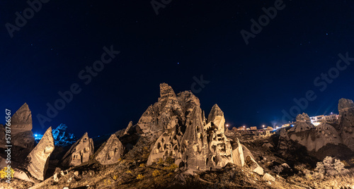 Night landscape Uchisar Castle ancient cave in Cappadocia with star, Turkey