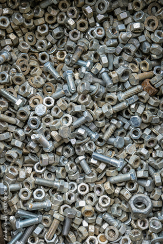 Nuts, bolts, screws, metal products for construction.