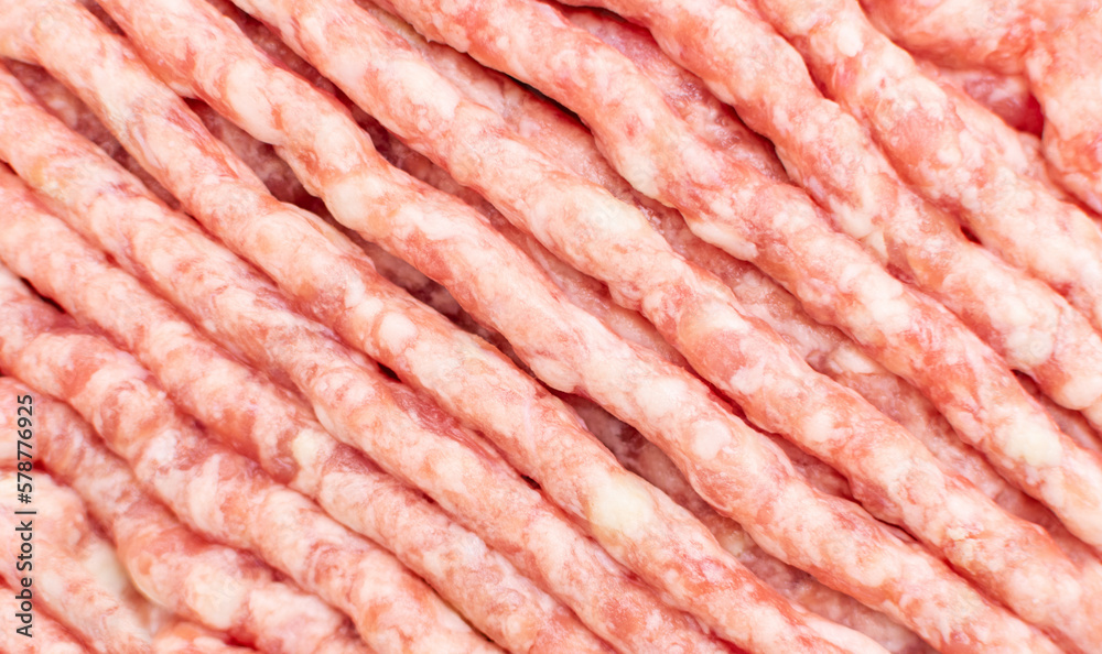 Raw fresh ground pork and beef minced meat, uncooked mincemeat close-up, top view. Ingredient for cooking burger, food. Raw fresh ground pork and beef minced meat, uncooked mincemeat close-up, top view. Ingredient for cooking burger, food.