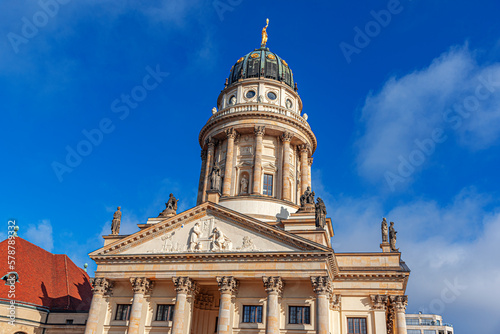 Berlin - French Cathedral at sunrise against the blue sky. photo