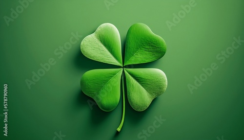 Four leaf clover shamrock with green background