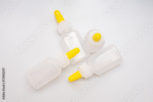 Children's medical potion bottles on a white background