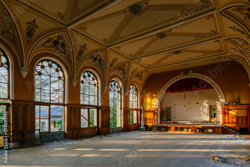 Large hall of abandoned building in gothic style