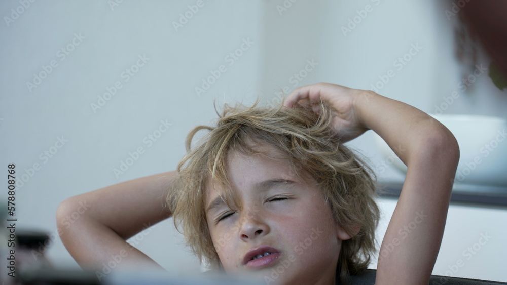 Child reacting to mistake with OH NO expression. Kid eyes closed not liking mistake. Displeased boy Child reacting to mistake with OH NO expression. Kid eyes closed not liking mistake. Displeased boy