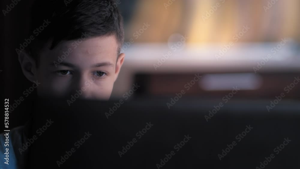 Teenage Boy Typing on Laptop - Working on Studies and Learning Online Teenage Boy Typing on Laptop - Working on Studies and Learning Online