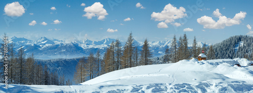 Winter hazy Dachstein mountain massif panorama (Austria).
