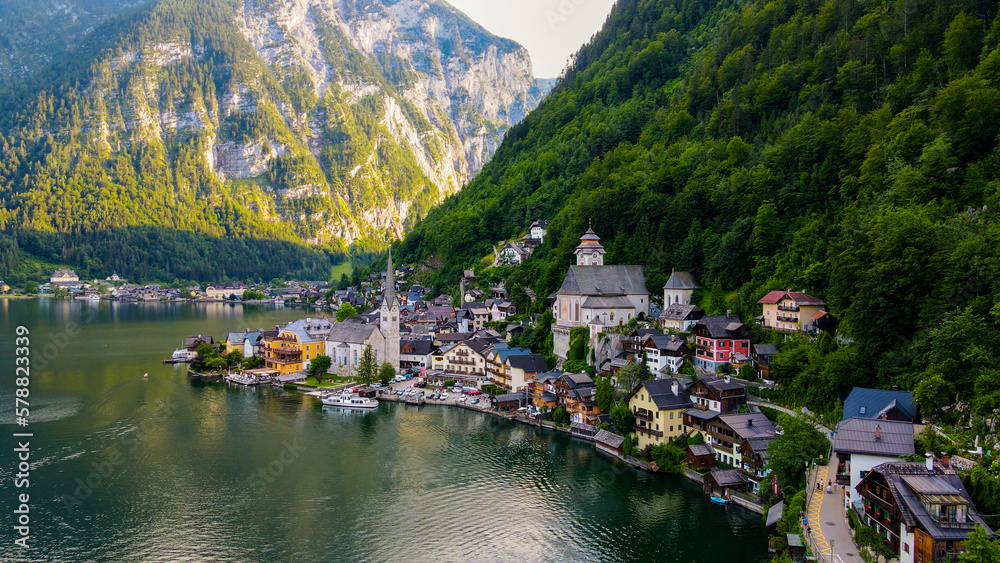 Fototapeta premium Aerial view of Hallstatt village, mountains background in Austria Stock Photos and Images