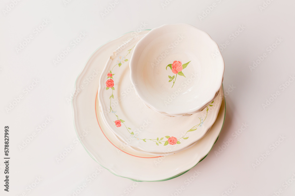 Closeup of porcelain plates and bowls