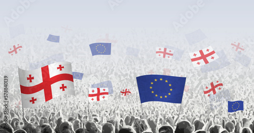 Peoples protest or cheering with flag of Georgia and European Union.