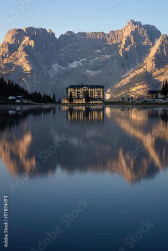 Pio XII hospital reflecting in Lake Misurina, Cortina d'Ampezzo, Italy © Giulio