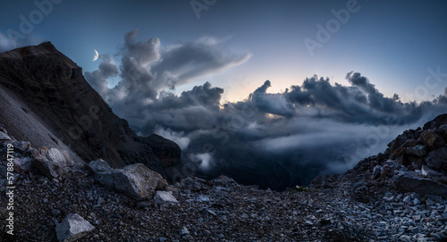 Clouds after sunset in the Tofane range, famous mountains in Cortina d'Ampezzo, Italy