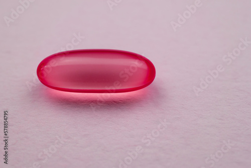 Pink pill, colorful tablet, medicines, drugs, health care concept photo