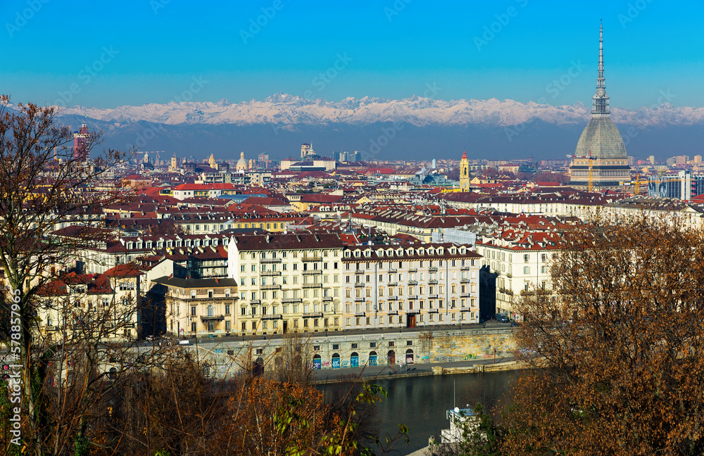 Image of Turin cityscape with old buildings and mountains, Italy
