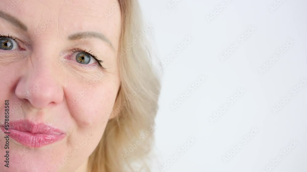 Portrait of happy woman smiling and standing isolated on white background girl with perfect smile looking right Beautiful female smile after teeth whitening procedure. Dental care. Dentistry concept. Portrait of happy woman smiling and standing isolated on white background girl with perfect smile looking right Beautiful female smile after teeth whitening procedure. Dental care. Dentistry concept.