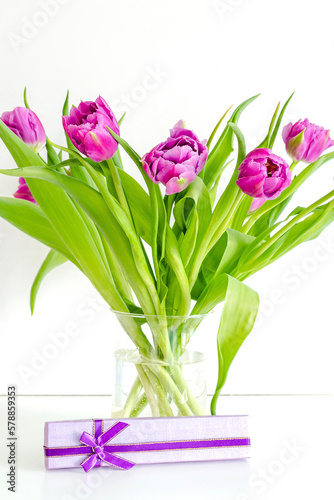 Violet purple tulips colorful bouquet in vase.Beautiful tenderness flowers,gift jewelry box,macro close up.Spring floral romantic card isolated.Flower shop,florist design,Womens,Valentines,Mother day © Дарья Воронцова