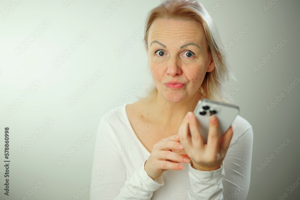 Communication Businesswoman showing cell phone lady show empty smartphone screen with positive expression, smiles broadly, dressed in casual clothing feeling happiness Mobile phone in female hand Communication Businesswoman showing cell phone lady show empty smartphone screen with positive expression, smiles broadly, dressed in casual clothing feeling happiness Mobile phone in female hand