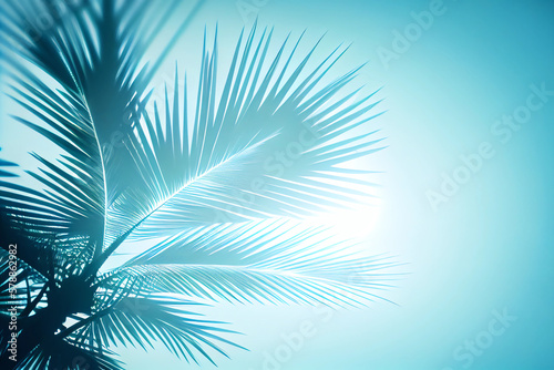 Blurred shadow from palm leaves on blue sky. Minimal abstract background for product presentation. Spring and summer.