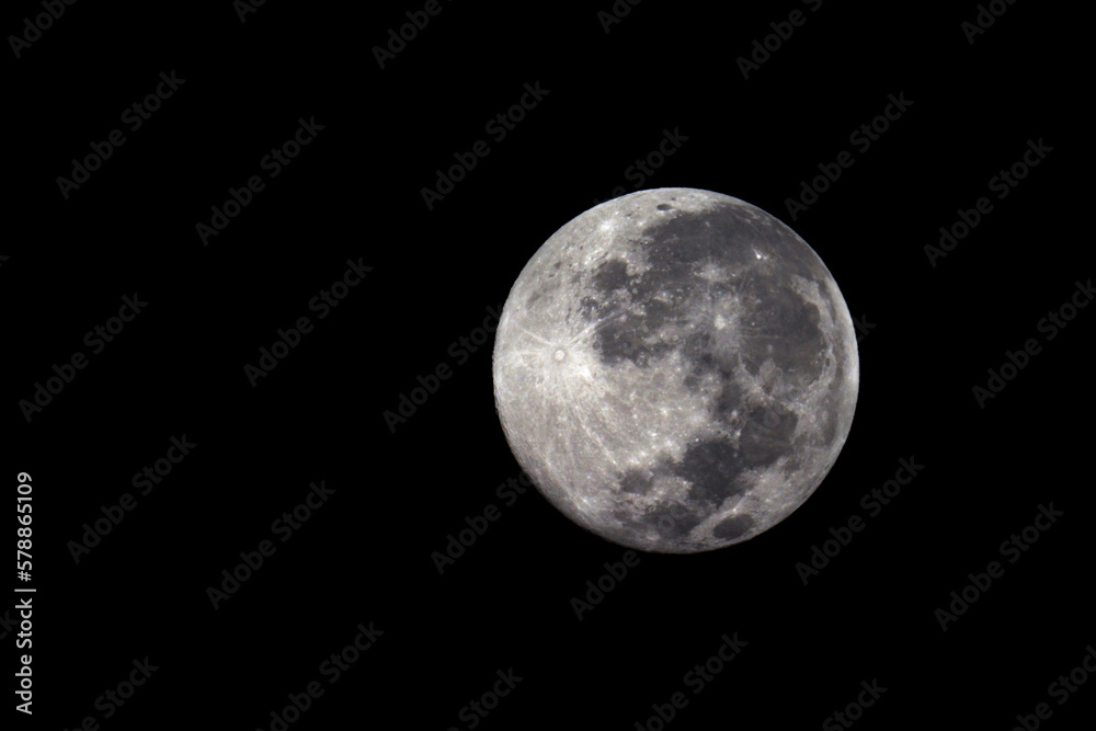 Naklejka premium The Moon is Earth's only natural satellite. It is the fifth largest satellite in the Solar System