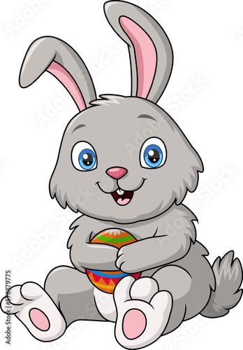 Cute rabbit cartoon holding an easter eggs