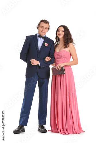 Beautiful couple dressed for prom on white background