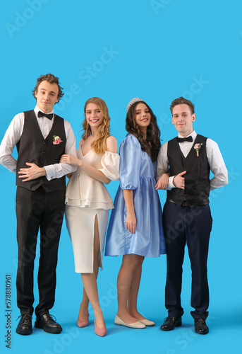 Four young adults dressed i...
