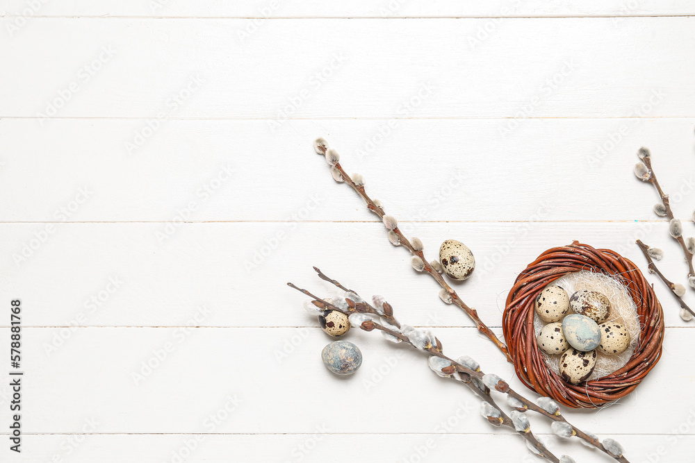 Fototapeta premium Composition with Easter quail eggs, pussy willow branches and wreath on white wooden background