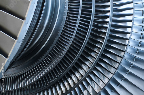 Shiny blades of high-speed steam turbine in workshop © nordroden