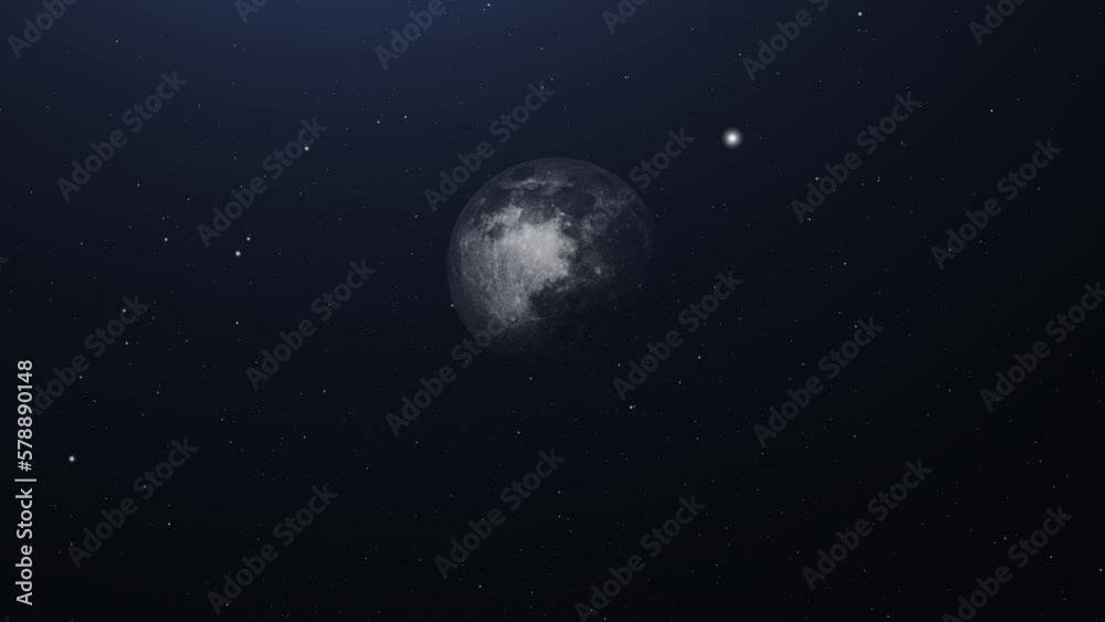 the moon moves in the darkness of space. the moon moves in the darkness of space.