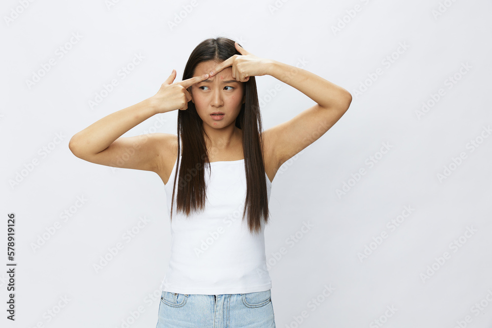 Asian woman facial skin problems, acne and inflammation, red rashes and allergies, chicken pox, sadness from rashes. Facial skin care concept for diseases and nerves Asian woman facial skin problems, acne and inflammation, red rashes and allergies, chicken pox, sadness from rashes. Facial skin care concept for diseases and nerves