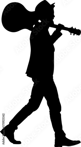 Silhouette of guitarist holding his guitar on his shoulder while walking, Cutout of man walking with guitar in hand.