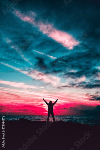 silhouette of a person on the beach