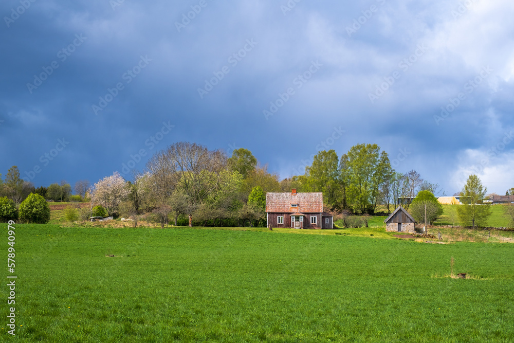 Rural landscape view with storm clouds on the sky