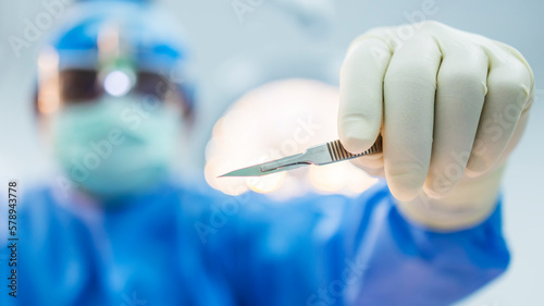 Photos Selective focus at surgeon's hand with blur background