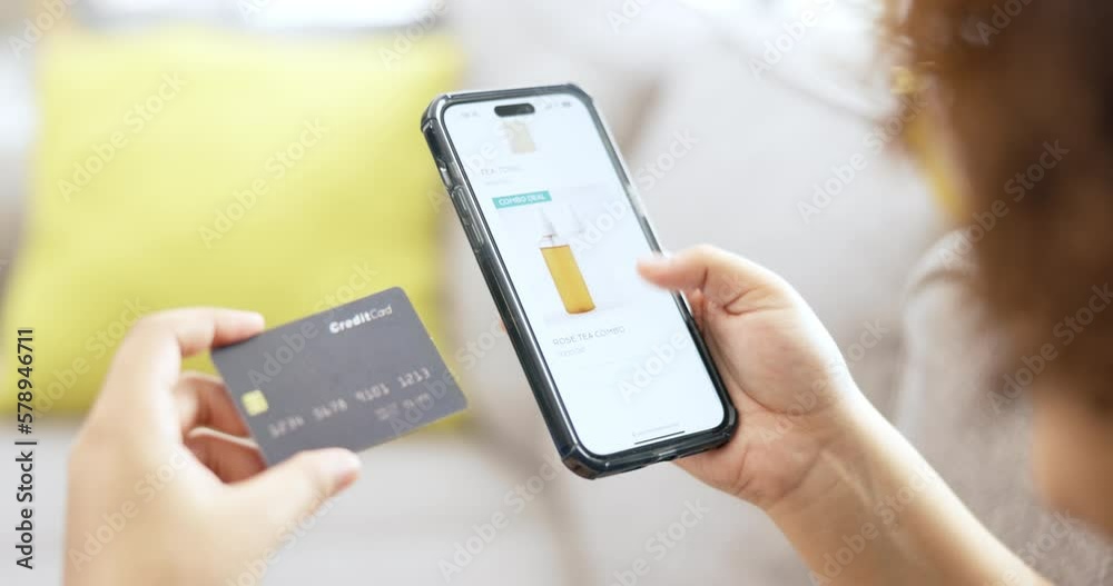Hands, smartphone and credit card for online shopping, girl and makeup choice on web store in lounge. Black woman, phone and e commerce ux for cosmetics, retail product or payment in home living room