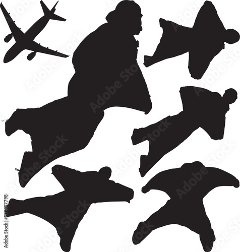 Wingsuit skydivers and plane vector silhouettes. Layered and fully editable photo