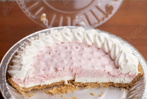 Half of a Frozen Strawberries and Cream Pie