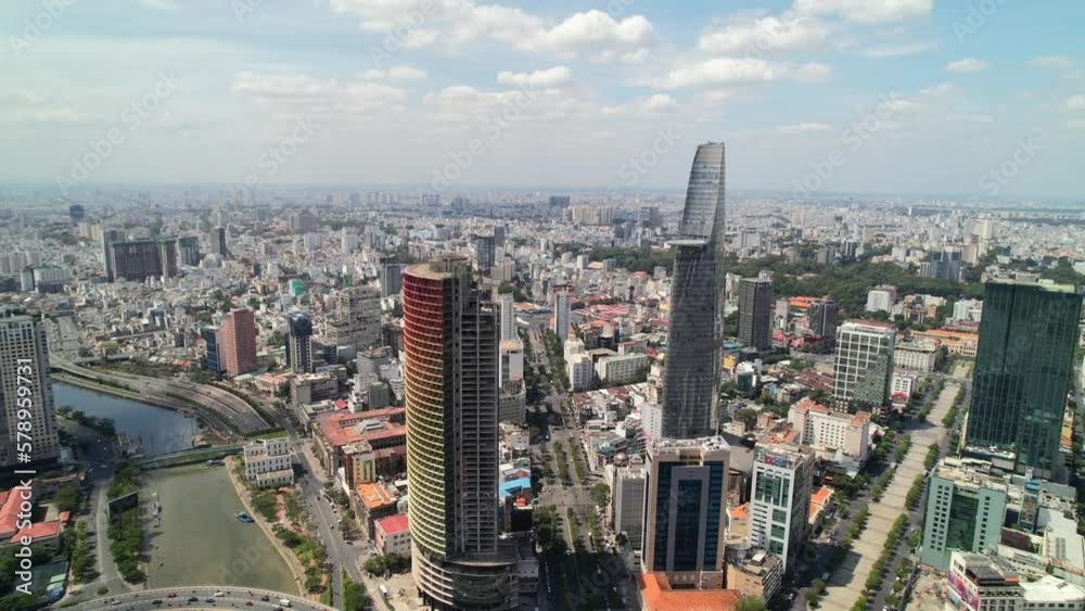 wide aerial of Bitexco Tower in District 1 Ho Chi Minh City Vietnam on a sunny day wide aerial of Bitexco Tower in District 1 Ho Chi Minh City Vietnam on a sunny day