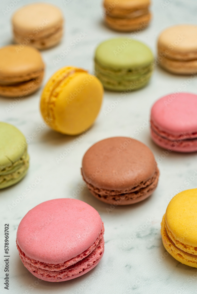 Above view of colorful macaroons on a marble background Above view of colorful macaroons on a marble background