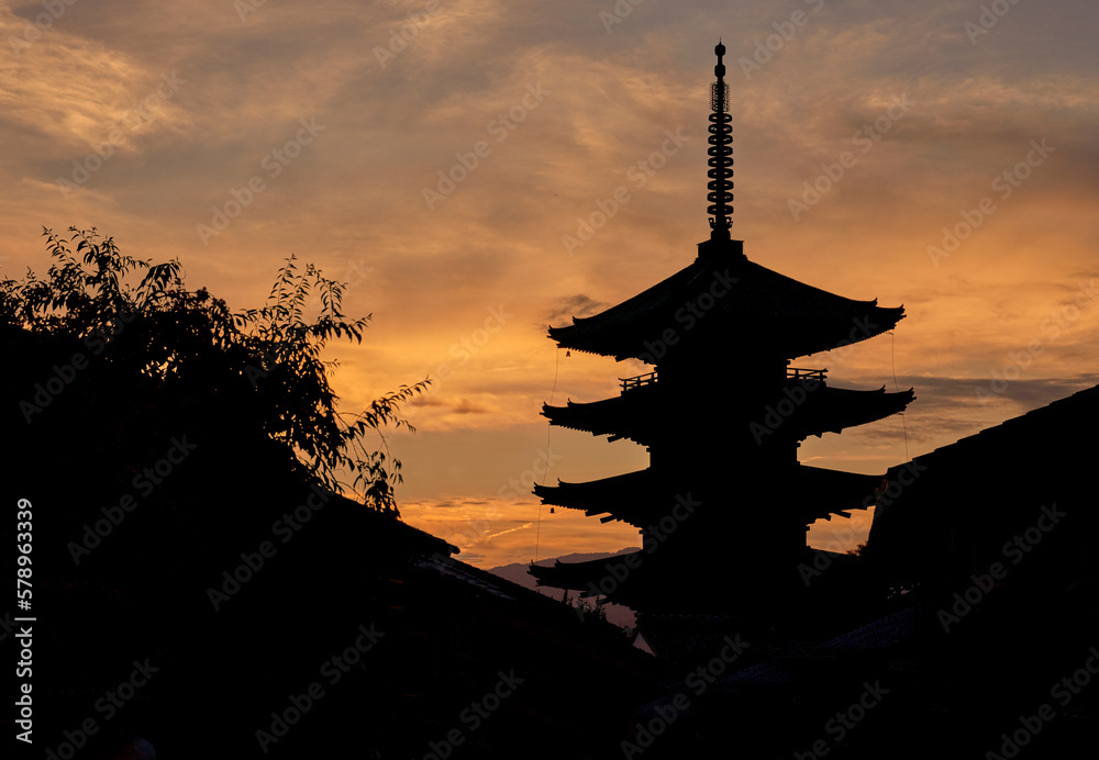 Yasaka pagoda against cloudy sky at sunset, Japan. Yasaka pagoda against cloudy sky at sunset, Japan.