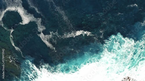 Drone shot of the wild coast of Lanzarote. Waves crashing on the wild coast of Lanzarote Spain. photo