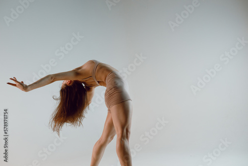 Young woman dancer dancing high heels dance