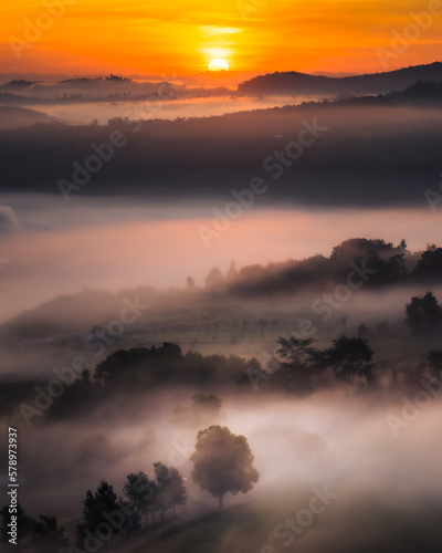 Beautiful sunrise in the hill with foggy and city in northern of thailand (Phetchabun province)