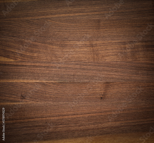 Old wood background. Dark tone walnut plank tabletop texture background. Wood planks desktop background.