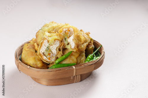 Tahu Isi Sayuran or Tahu Brontak or Gorengan is Deep Fried Stuffed Tofu. photo