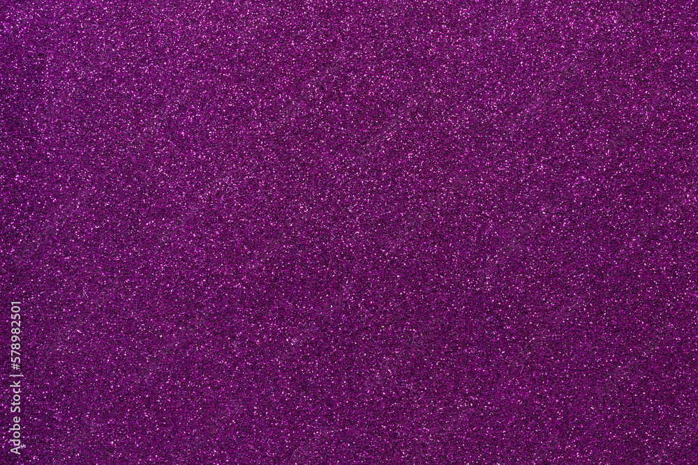 Abstract background filled with purple gold glitter