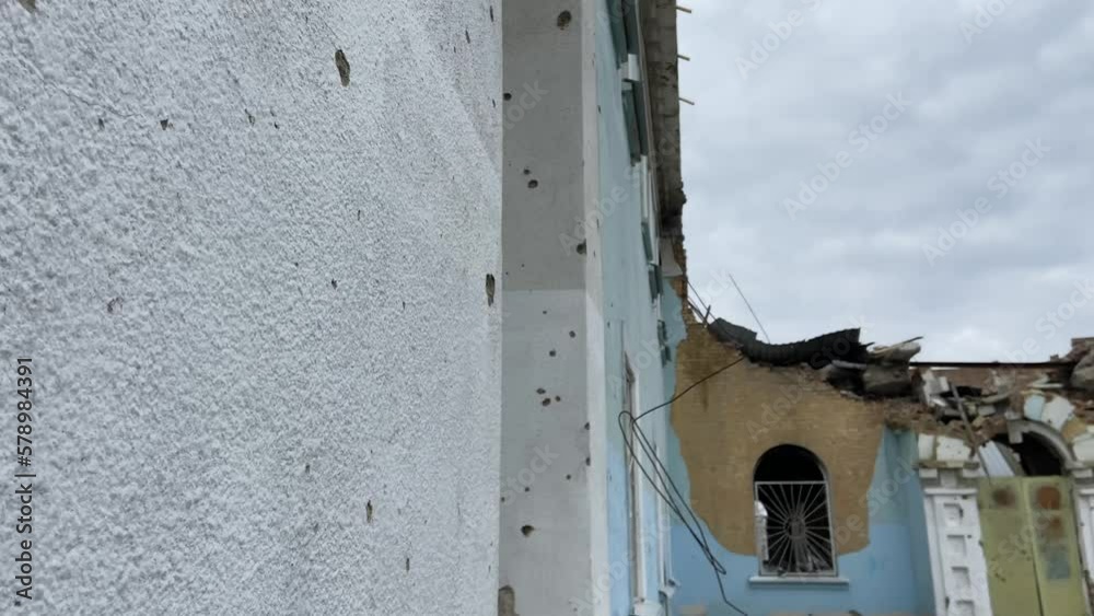 The war-destroyed cultural center in Irpen. Hitting a projectile in a structure. Occupation of the city, consequences of the war. High quality 4k footage The war-destroyed cultural center in Irpen. Hitting a projectile in a structure. Occupation of the city, consequences of the war. High quality 4k footage