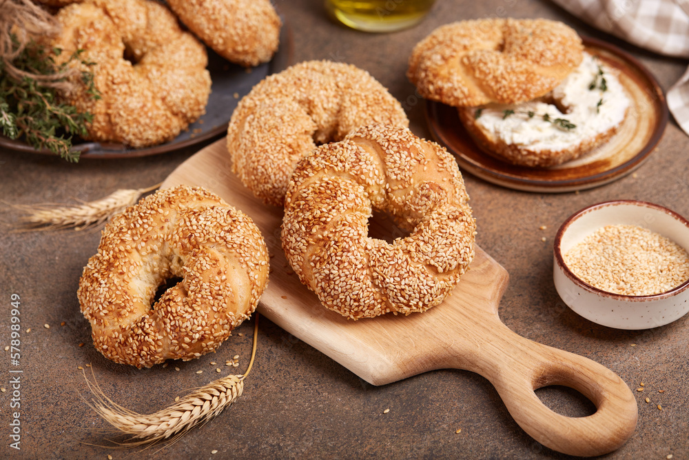 Bagels with sesame seeds. Freshly baked bread buns from yeast dough. 