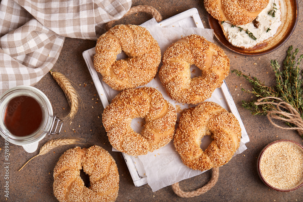 Bagels with sesame seeds. Freshly baked bread buns from yeast dough. 